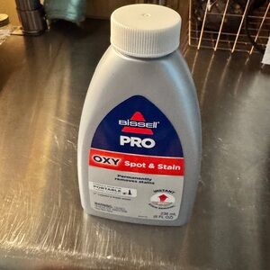 Bissell Spot & Stain Cleaner - Gray Bottle with Blue and Red Label